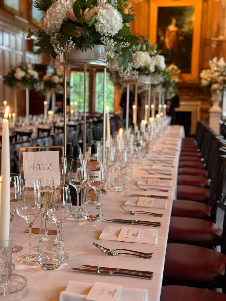 Wedding set up at Barnbougle Castle - place cards and table name in gold ink calligraphy