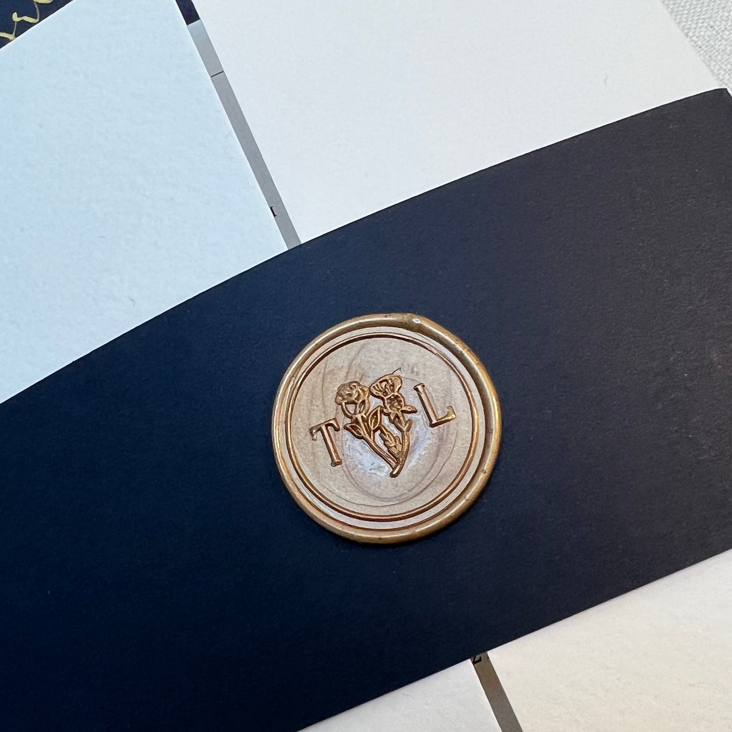 Personalised Wax seal in gold wax with navy paper