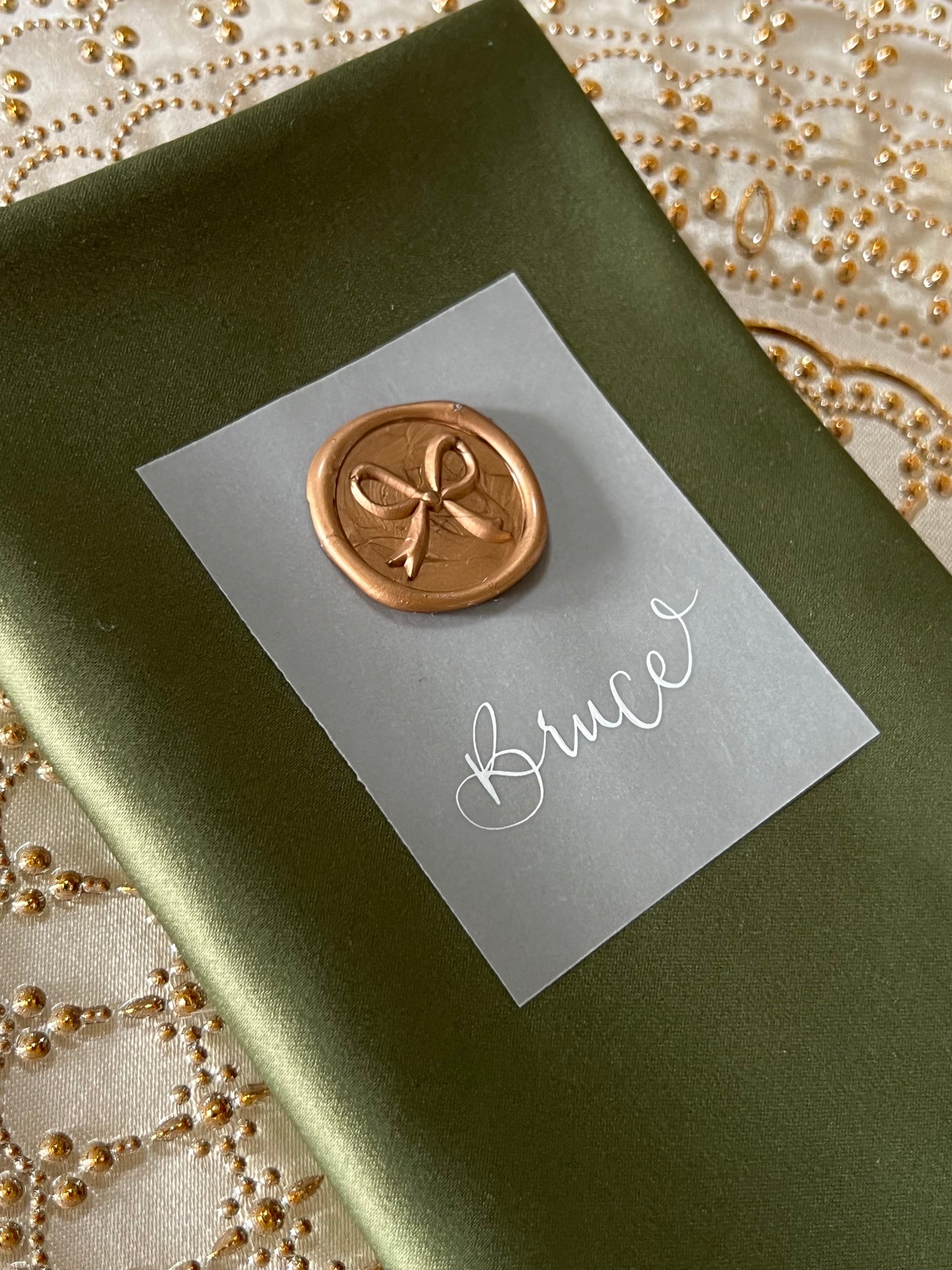 Elegant Vellum Place Card with Bow Wax Seal and Handwritten Calligraphy
