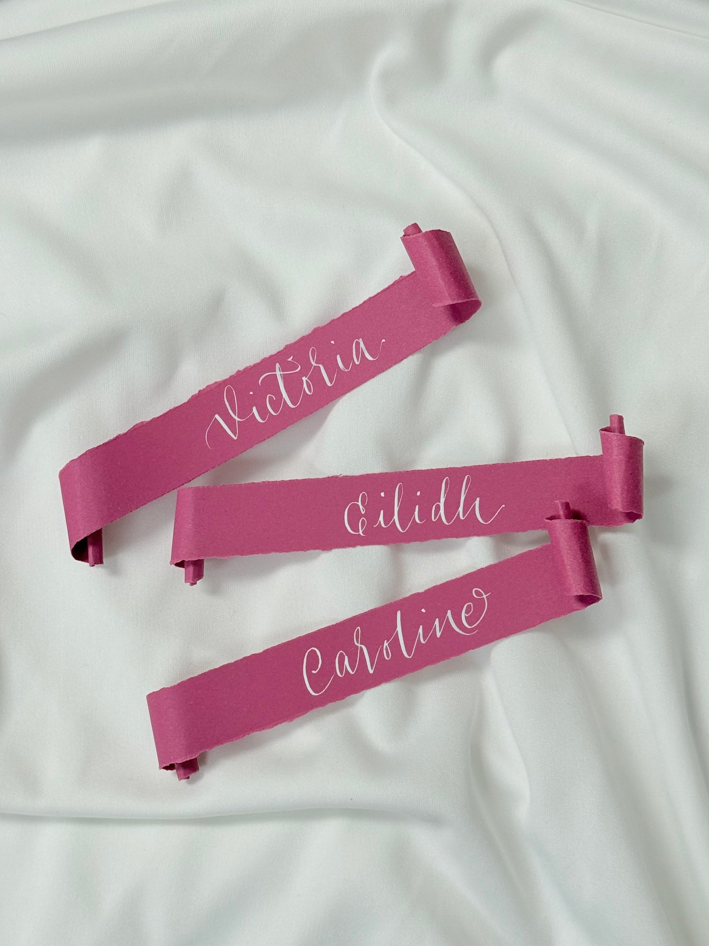 Handwritten place card scrolls