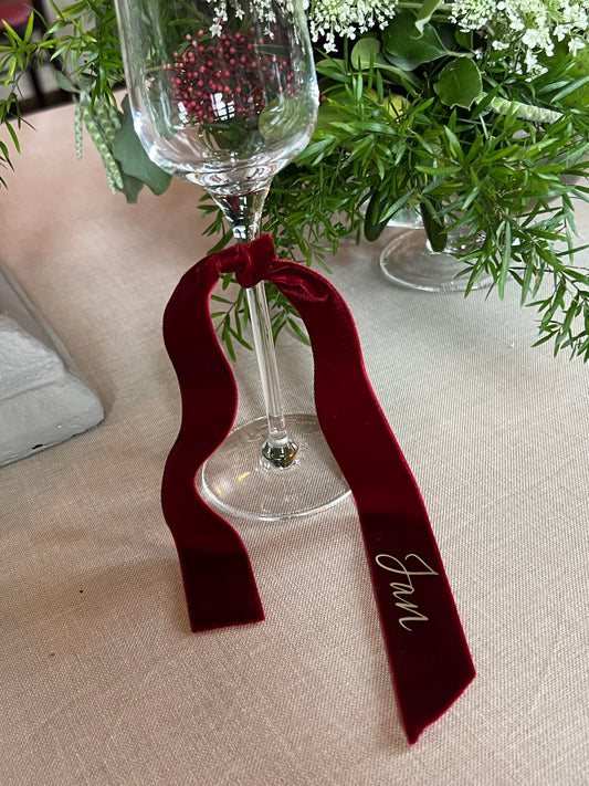 Burgundy Velvet ribbon name place on a glass
