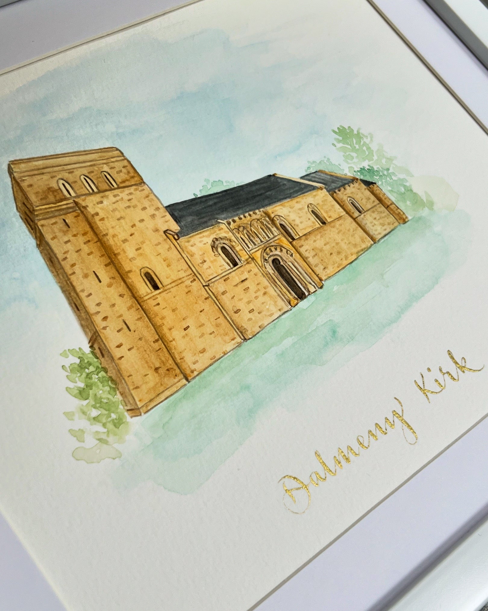 Hand made, framed watercolour painting of Dalmeny Kirk. “Dalmeny Kirk handwritten in gold ink calligraphy. Watercolour painting of a church as a gift for the Mother of the Bride and Mother of the Groom.