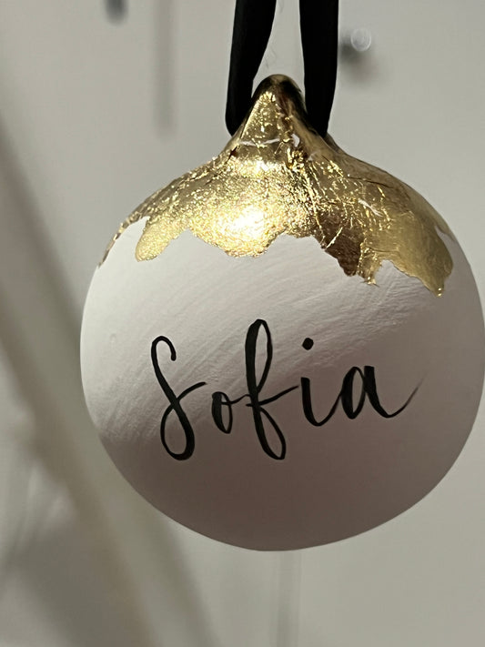 Ceramic gold leaf bauble with calligraphy personalisation