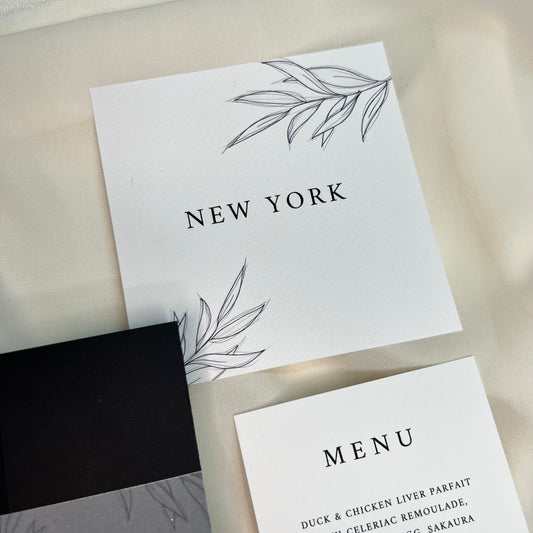 new york stationery range with black and white table name 