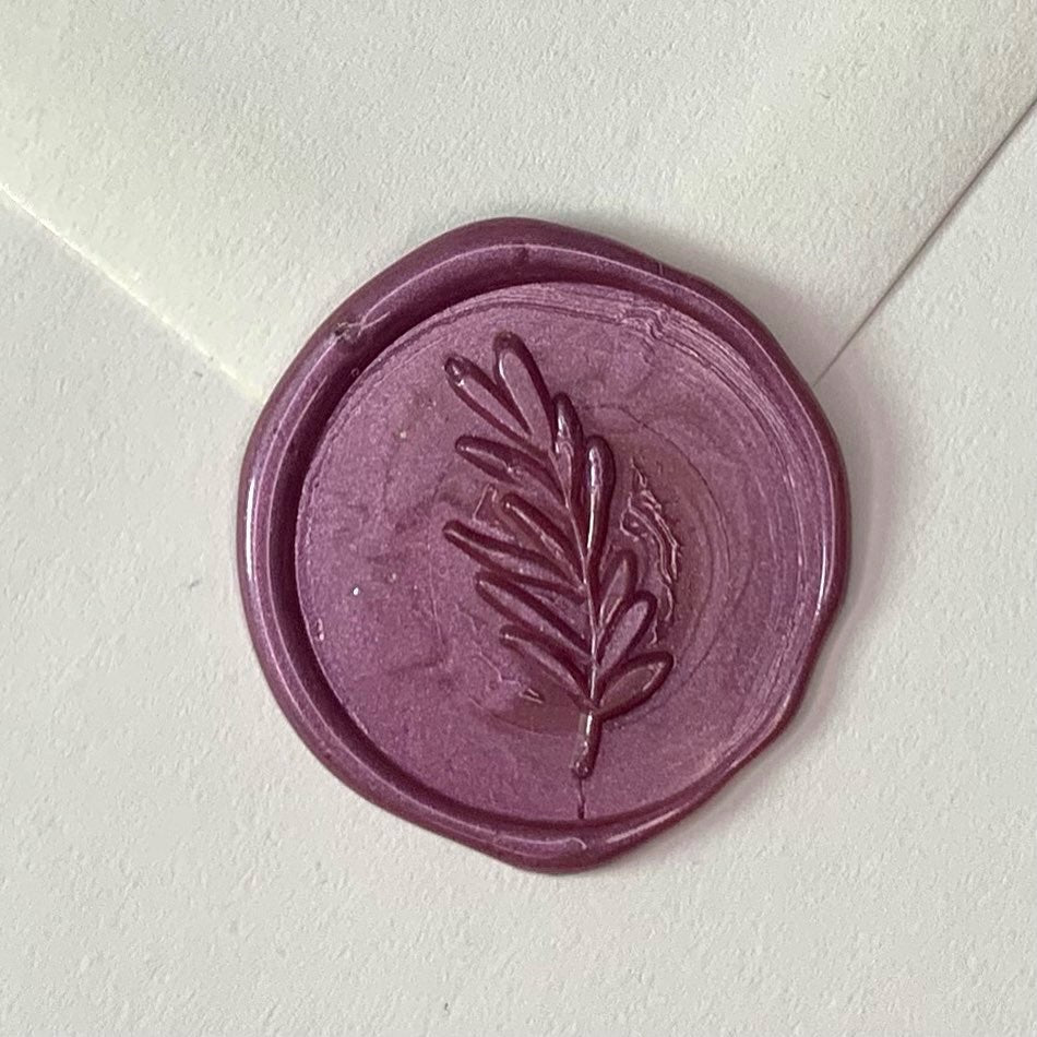 mauve plum wax seal with foliage leaf design